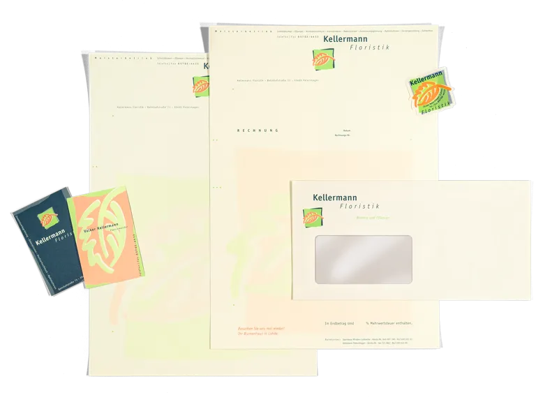 Foto: Geschäftspapier-Ausstattung, Typografie mit Logo aus stilisiertem Blatt