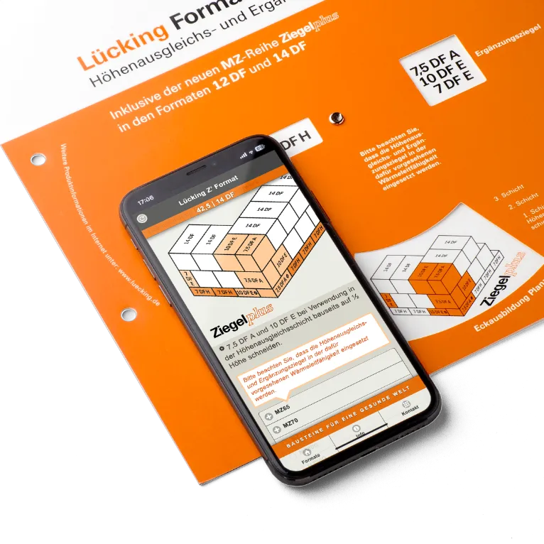 Foto: Z’Format App auf einem Smartphone, im Hintergrund der analoge Vorgänger als Drehscheibe
